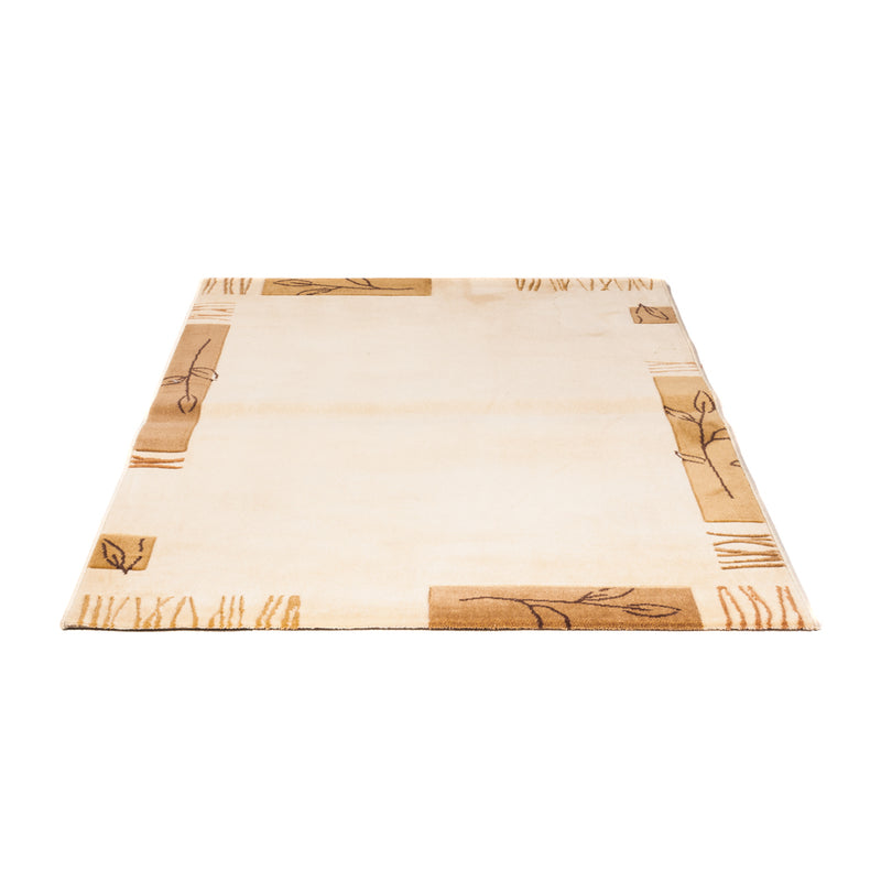 Moderner Teppich - 170 x 120 cm - beige