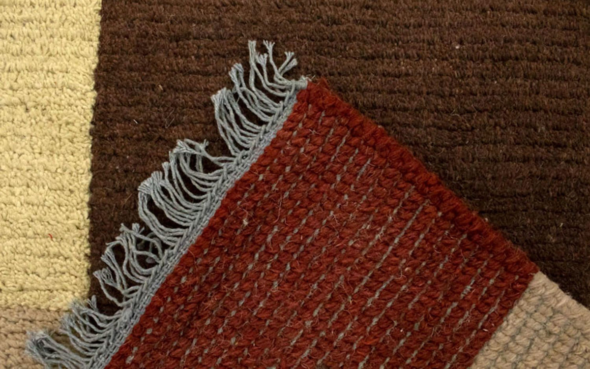 Nepal Teppich 140 x 70 cm - braun