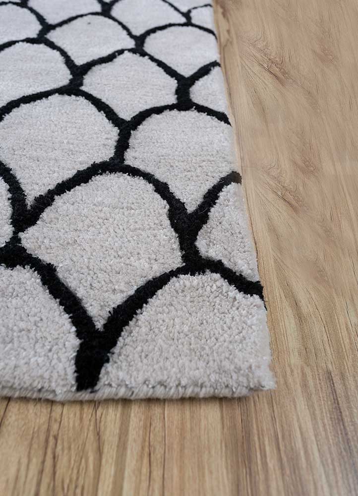 Wollteppich - 180 x 270 cm - schwarz-weiß